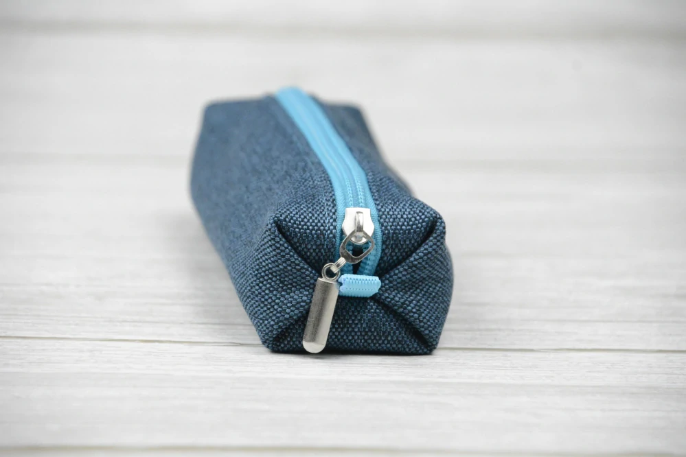 Penál mini modrý s tyrkysovým zipem