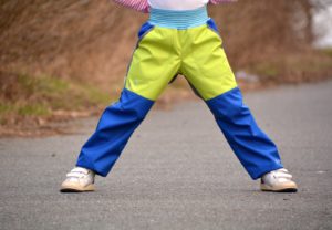 Softshellové kalhoty dětské kombinace modrá/šedá/limetka